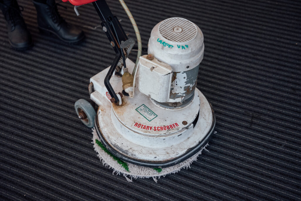 Close-up of a Green Clean Team carpet scrubber in use during an eco-friendly carpet cleaning service in Bendigo, Central Victoria